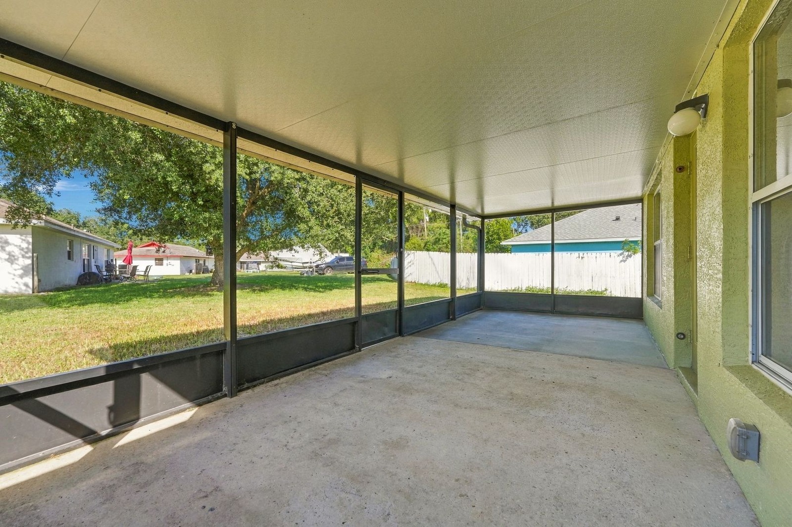 Screened porch along the side of the home at 707 Merrimac St SE