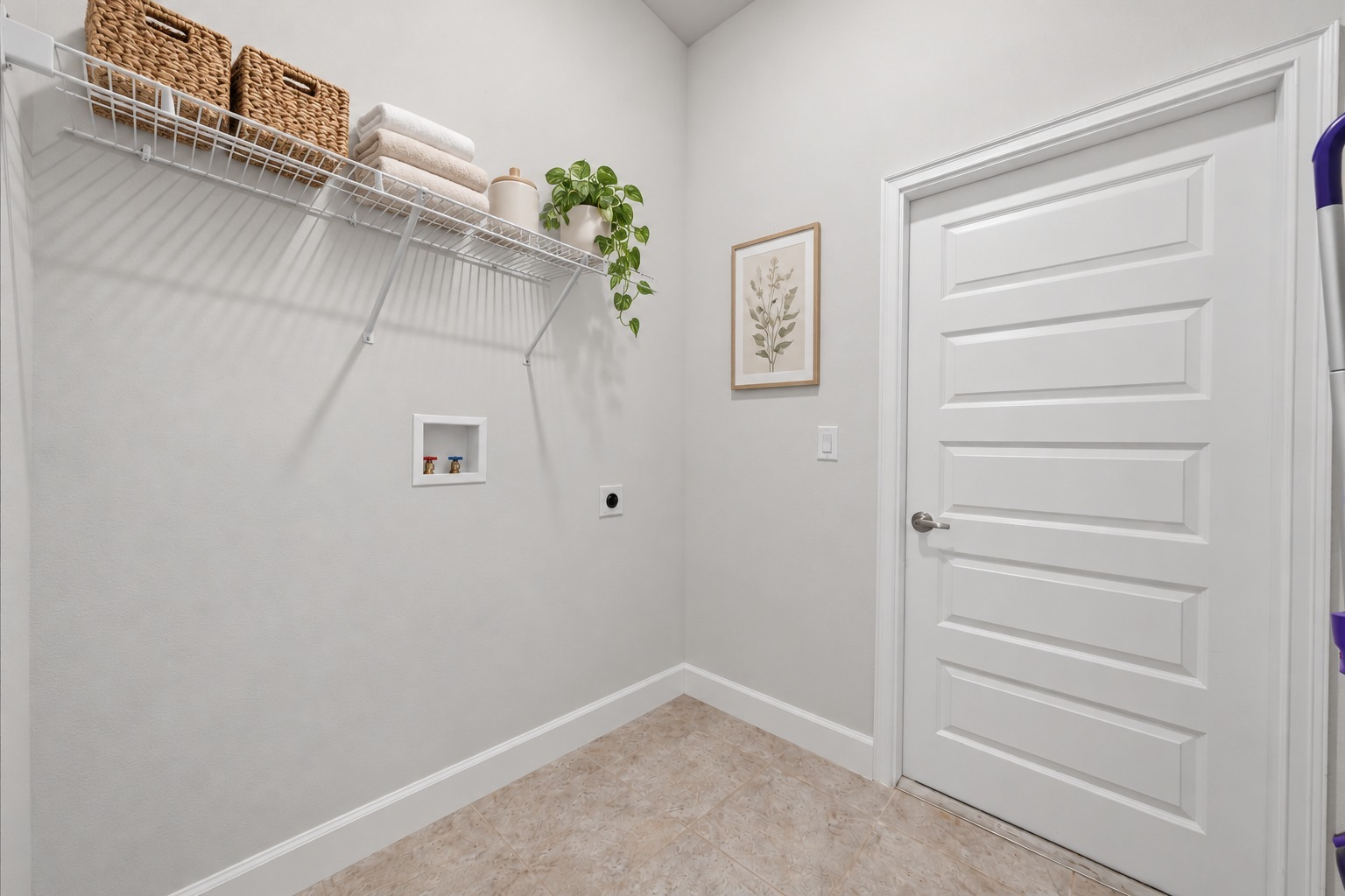 Indoor laundry room with washer and dryer hookups at 1261 Tupelo Cir