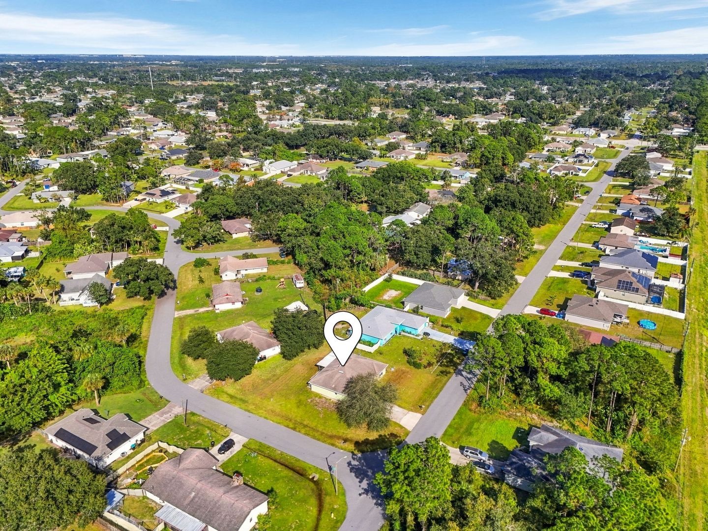 High aerial view of Palm Bay with location marker on 707 Merrimac St SE