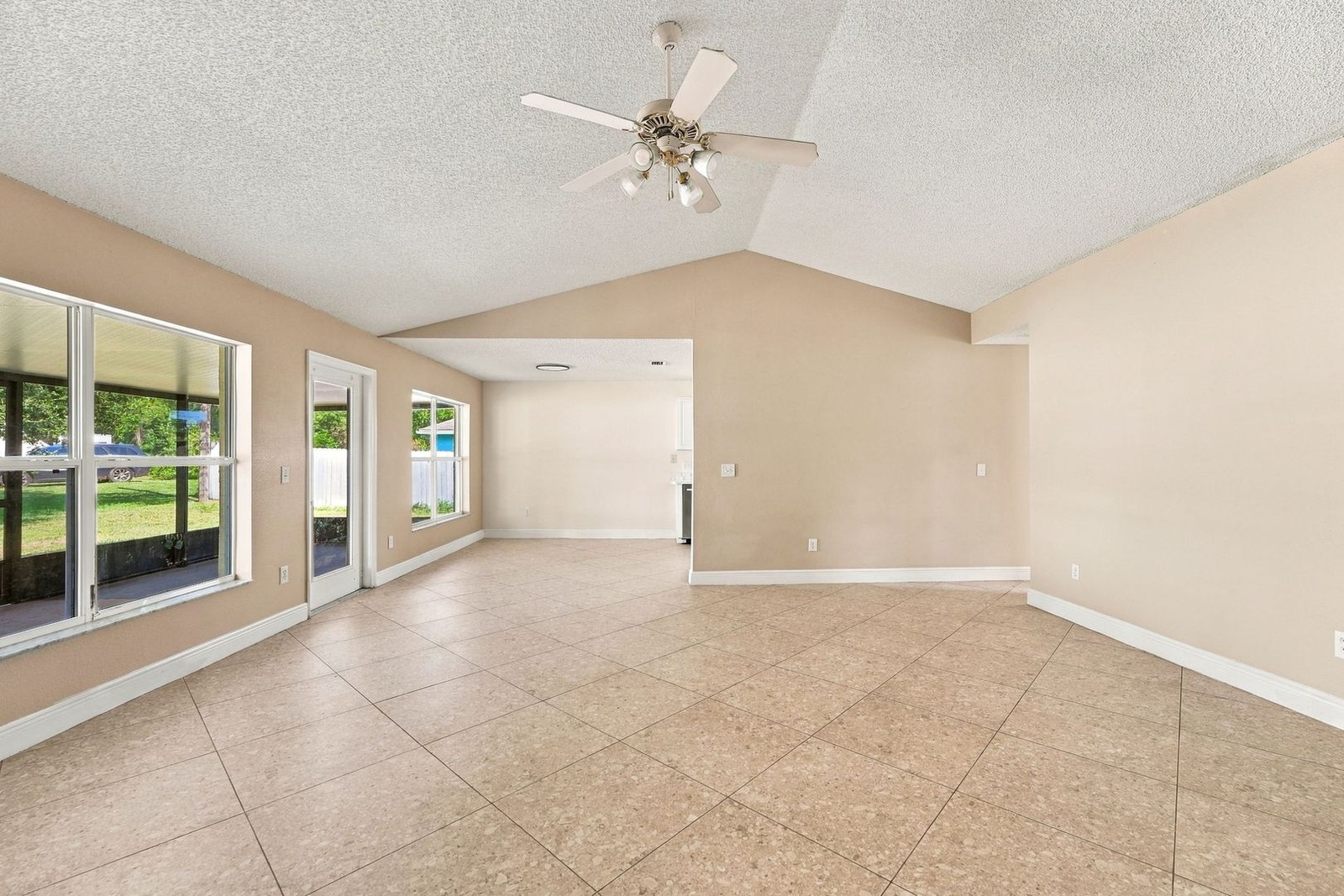 Great room with windows and a door to the screened porch at 707 Merrimac St SE