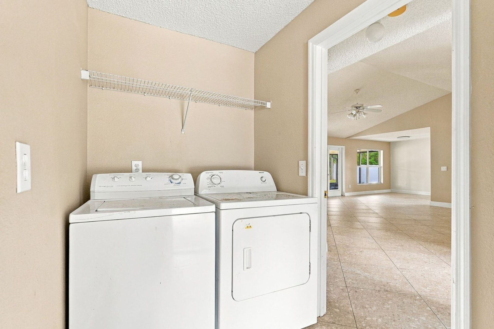 Indoor laundry room with washer and dryer at 707 Merrimac St SE