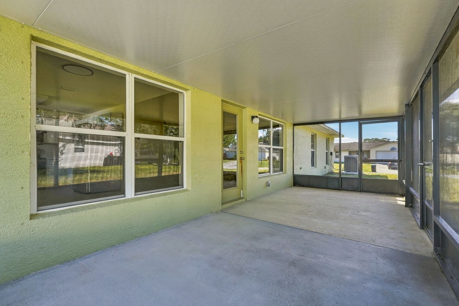 Screened porch with concrete floor at 707 Merrimac St SE