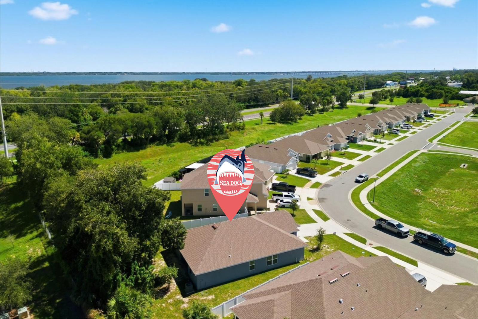 Aerial view of 1261 Tupelo Cir in the Hickory Ridge community with the Indian River beyond