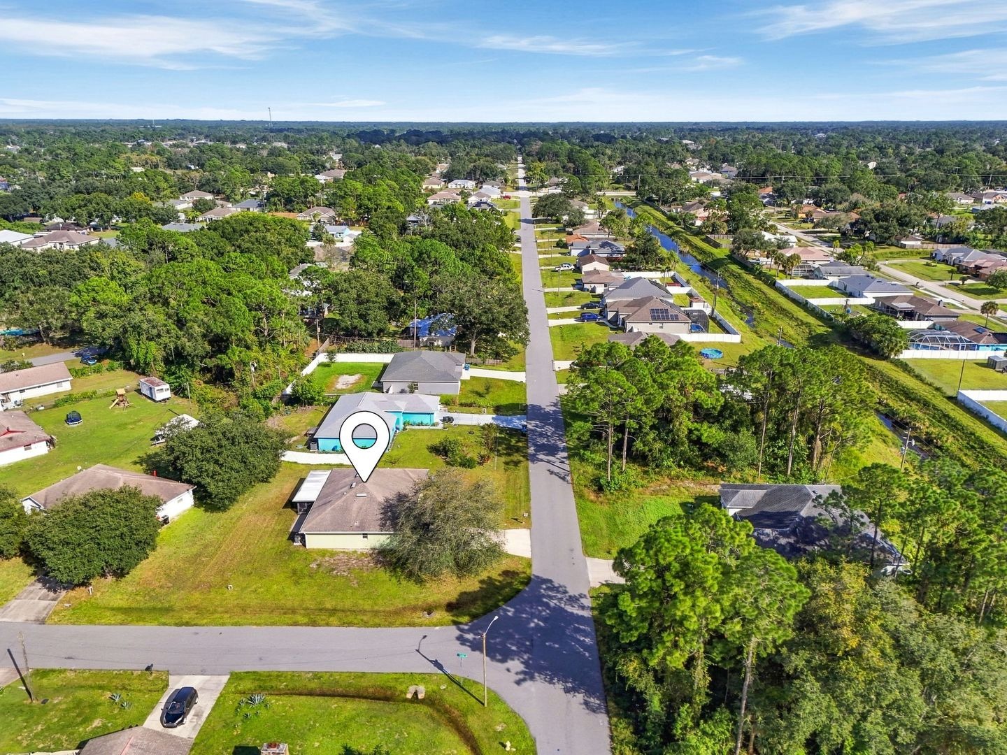Aerial view of the southeast Palm Bay neighborhood with location marker on 707 Merrimac St SE
