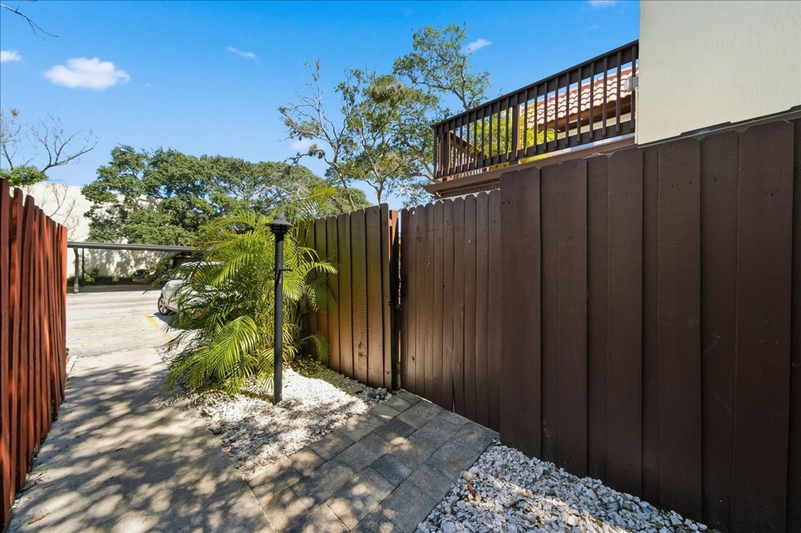 Assigned parking directly in front of the private patio fence