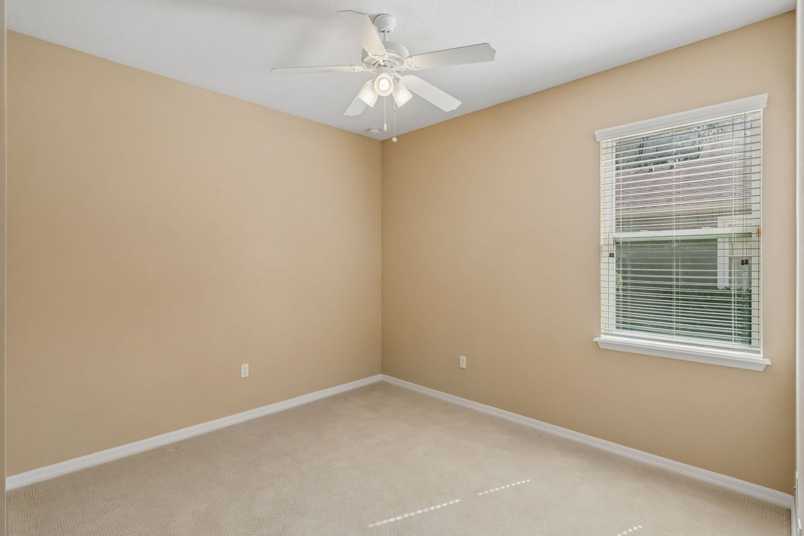 Second bedroom with ceiling fan at 374 Salt Marsh Ln