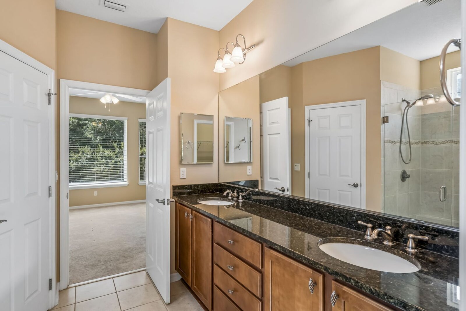 Primary bath dual vanities at 374 Salt Marsh Ln