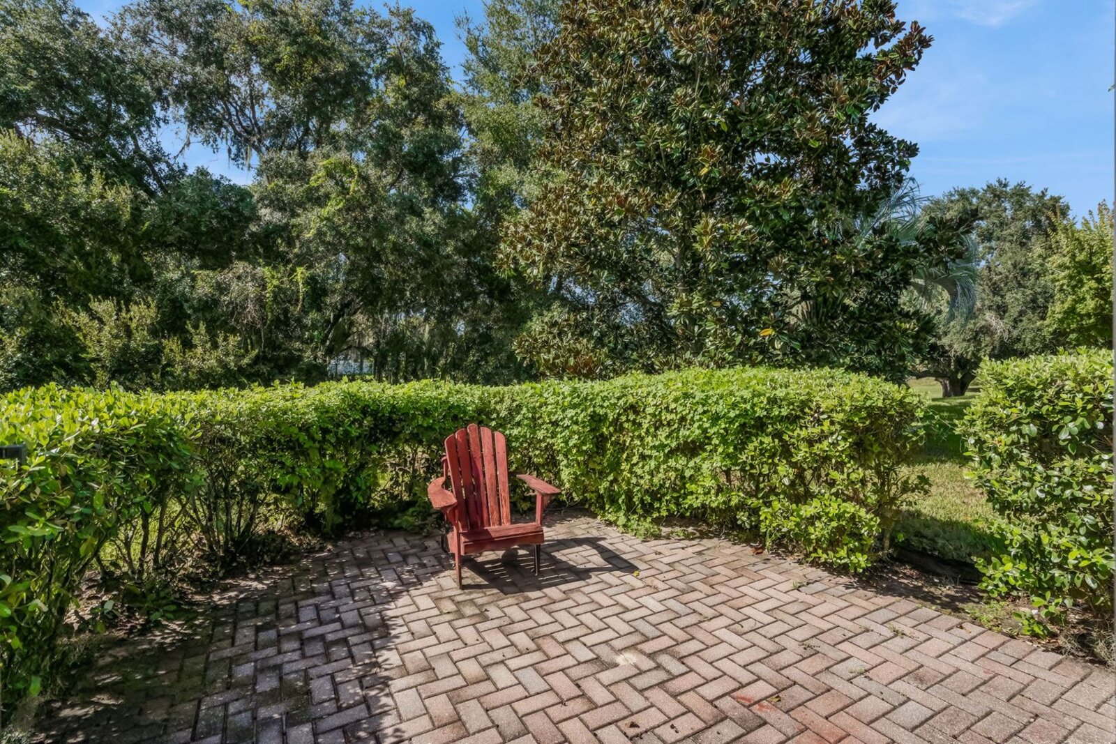 Paver patio and privacy landscaping with no rear neighbors at 374 Salt Marsh Ln