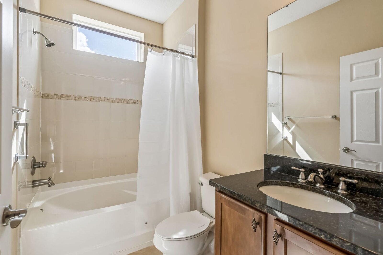 Guest bath with tub and shower at 374 Salt Marsh Ln