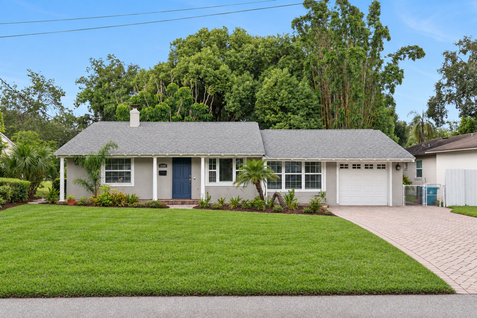 Front exterior of 3306 Eagle Blvd, a remodeled golf-front home in College Park, Orlando FL 32804