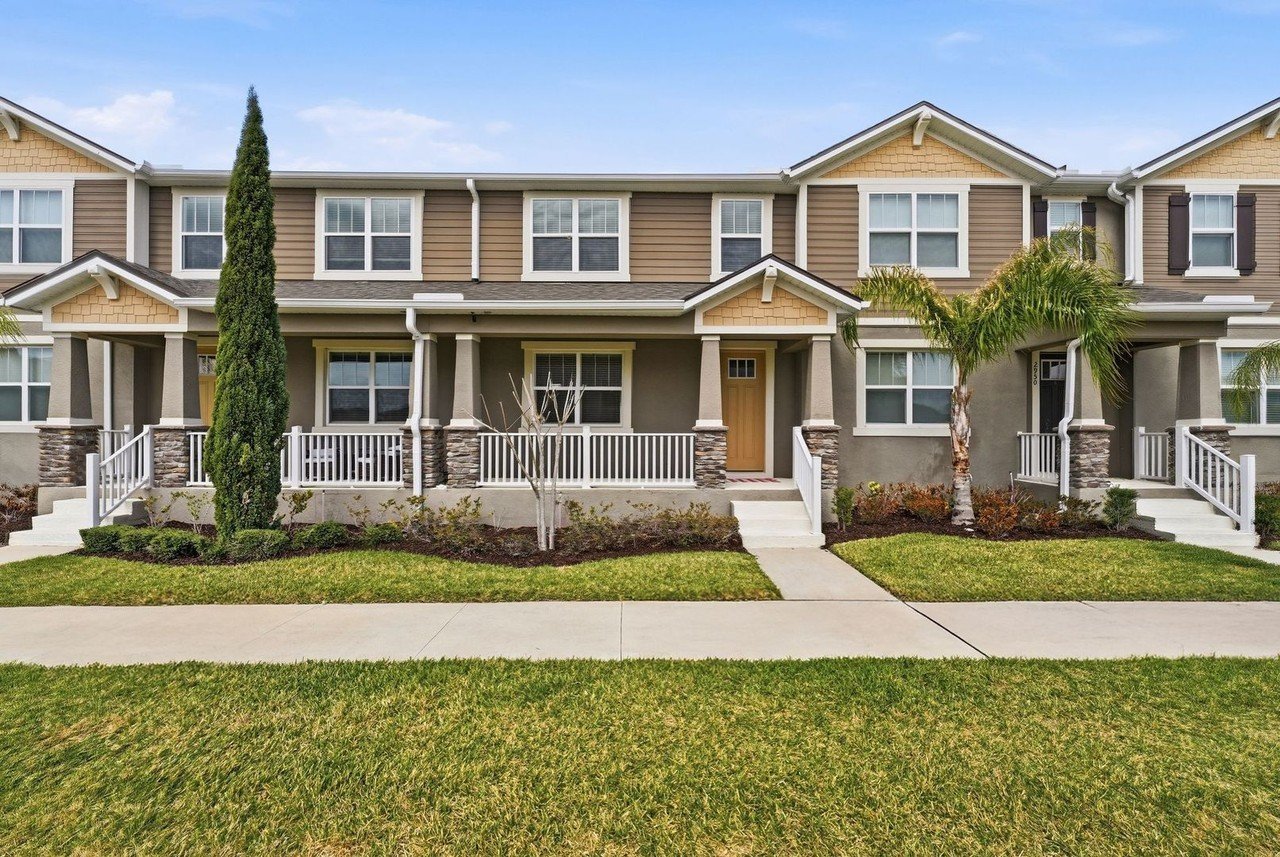 Craftsman-style front elevation and covered porch at 2946 Firebush Way in Waterbrooke