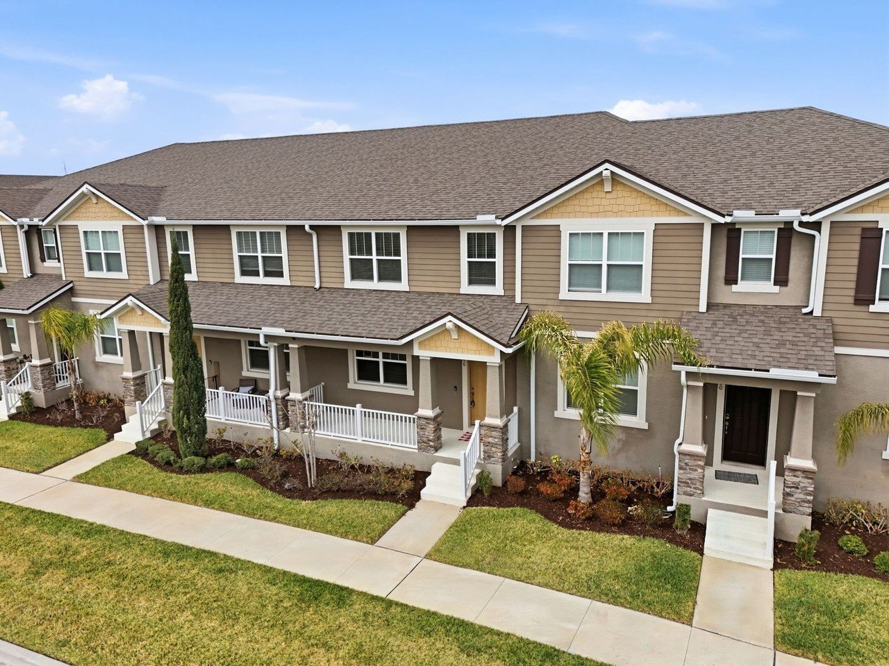 Waterbrooke townhome streetscape along Firebush Way in Clermont
