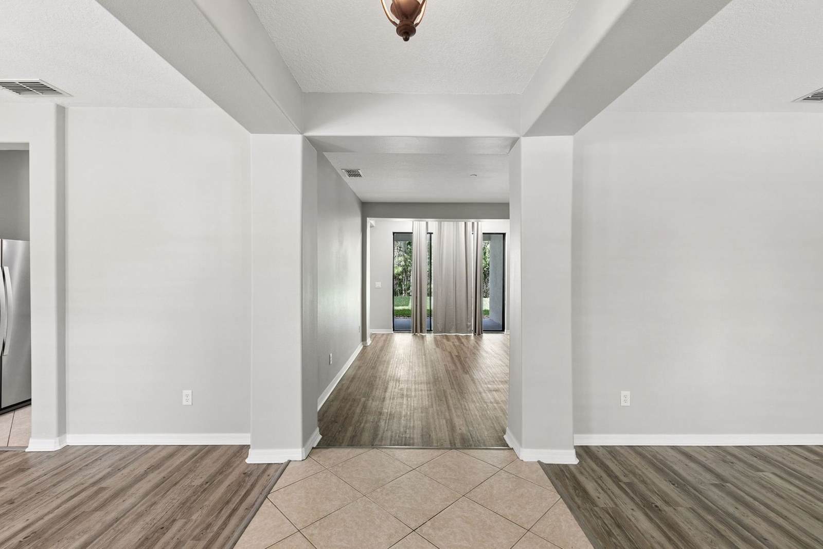 Central hallway toward the family room at 10249 Park Row Ct