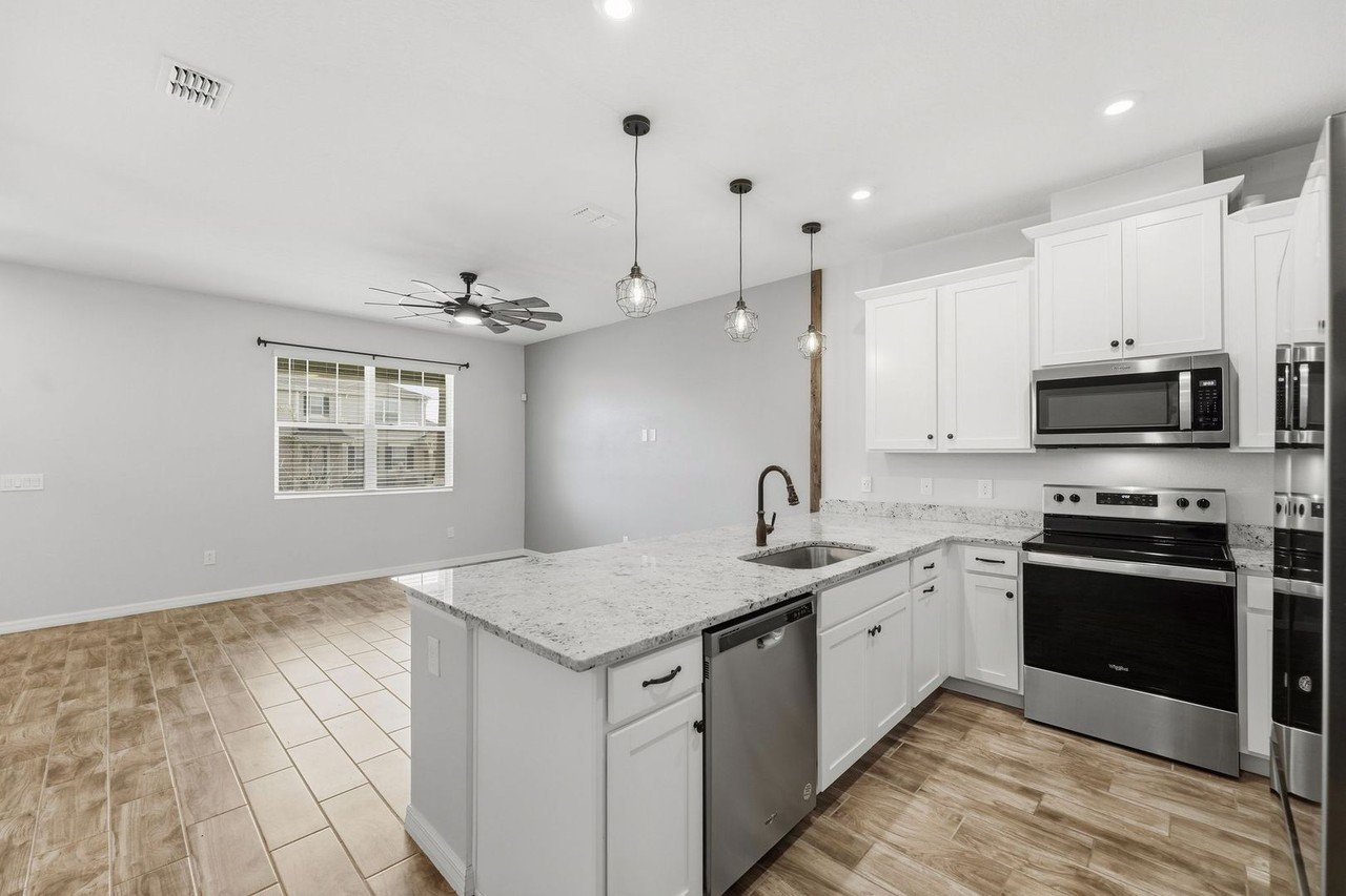 Kitchen island view toward the staircase