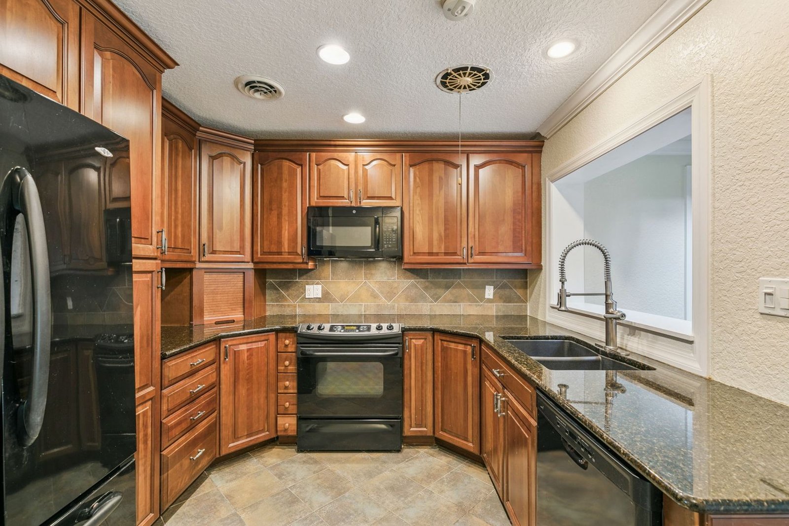 Wide view of the remodeled kitchen at 3306 Eagle Blvd