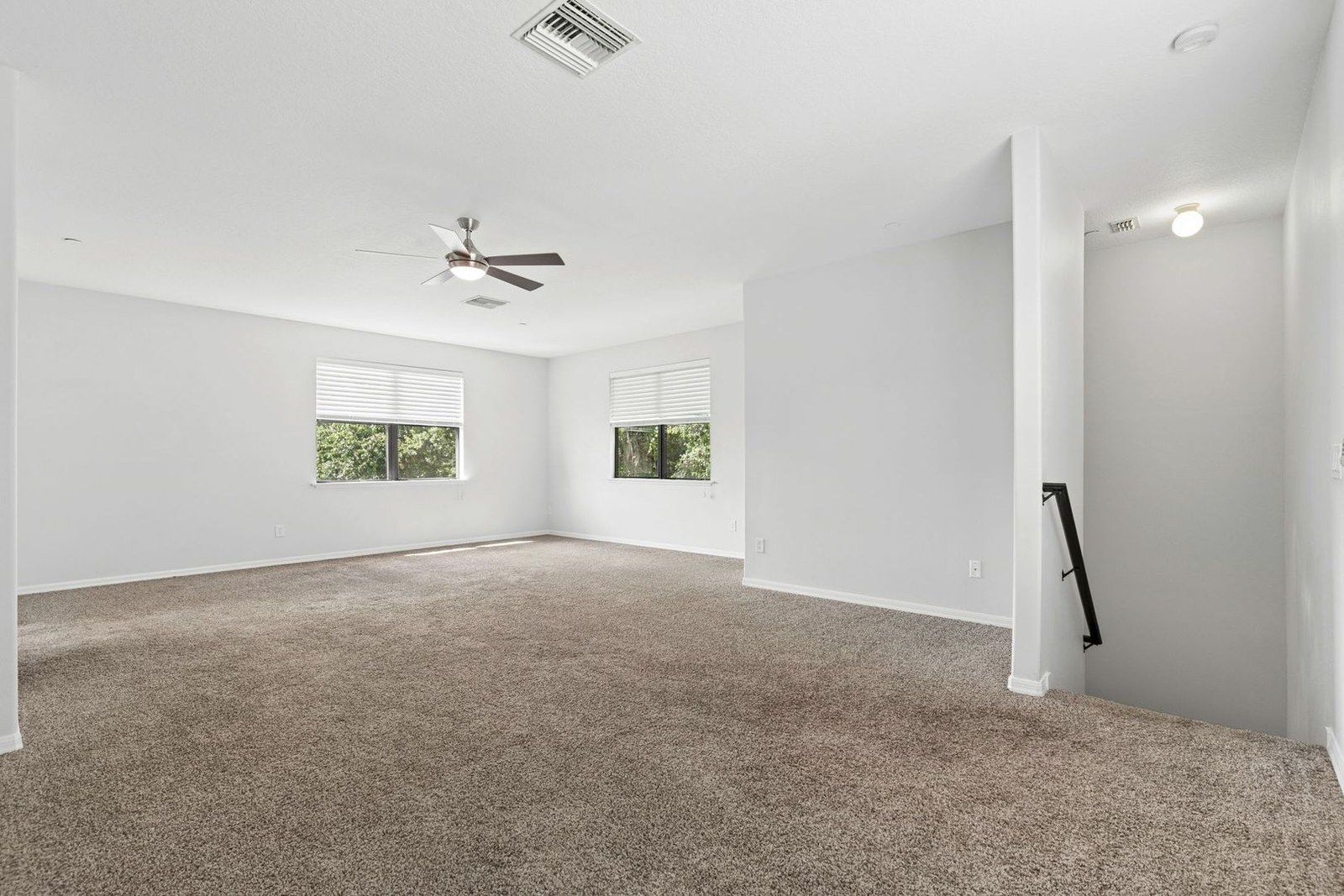 Primary bedroom with conservation views at 10249 Park Row Ct