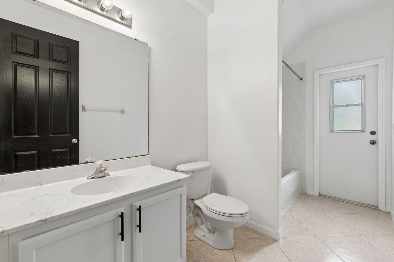 Full pool bath with exterior door and tub-shower at 10249 Park Row Ct