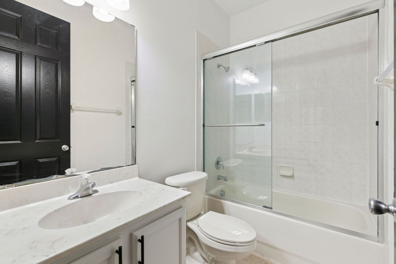 Fourth full bath upstairs with glass shower door at 10249 Park Row Ct