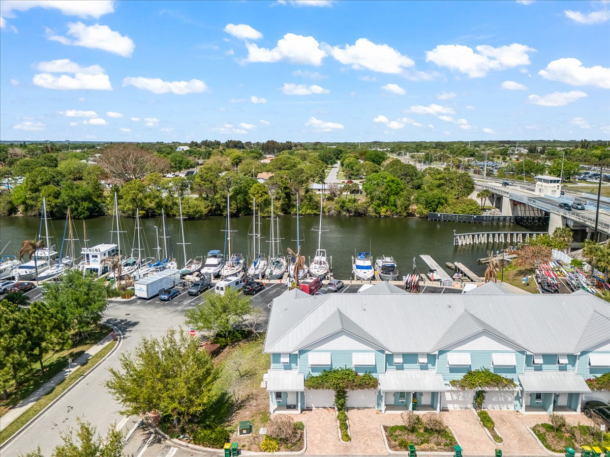Wide aerial showing marina and waterfront community