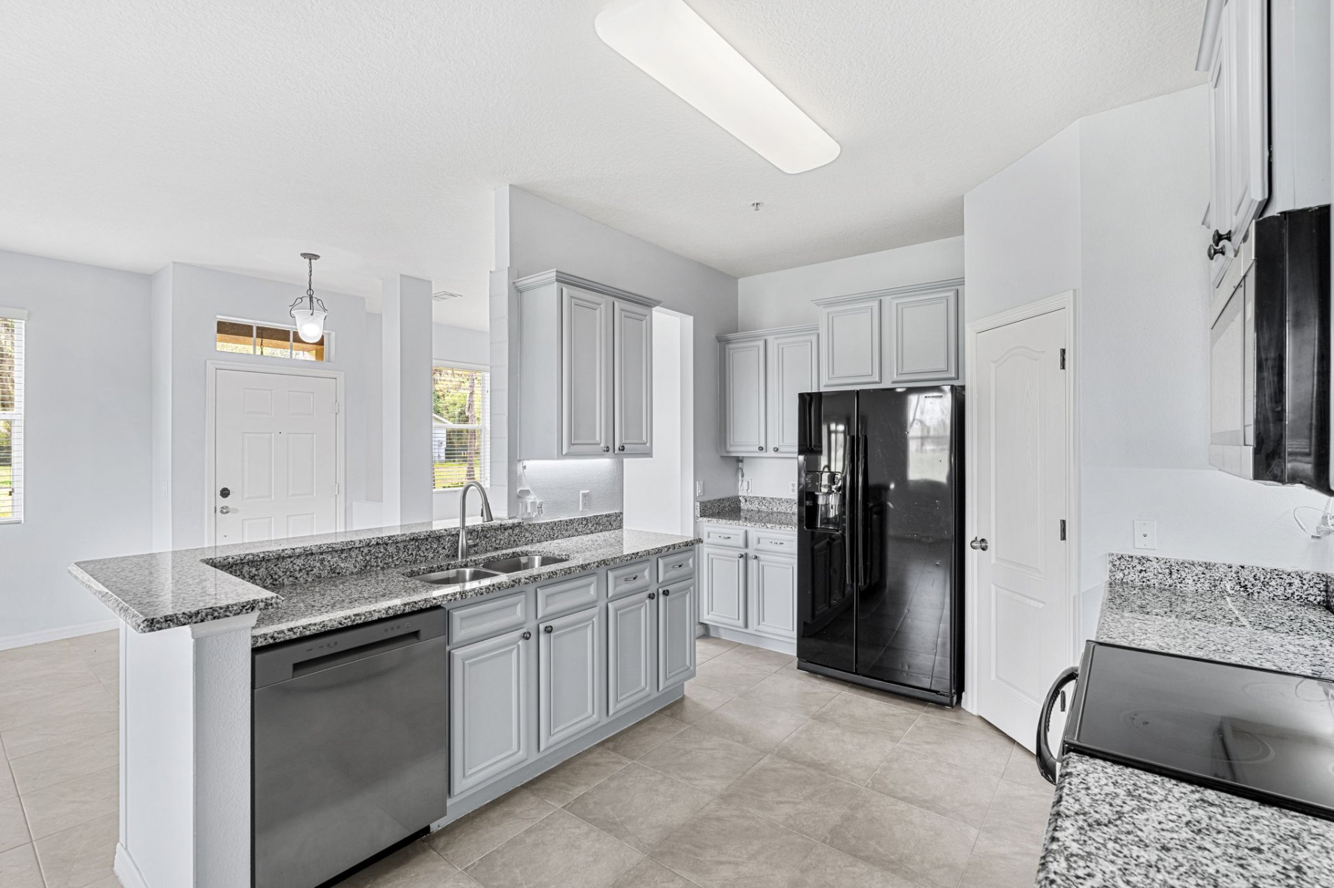 Kitchen island with granite breakfast bar