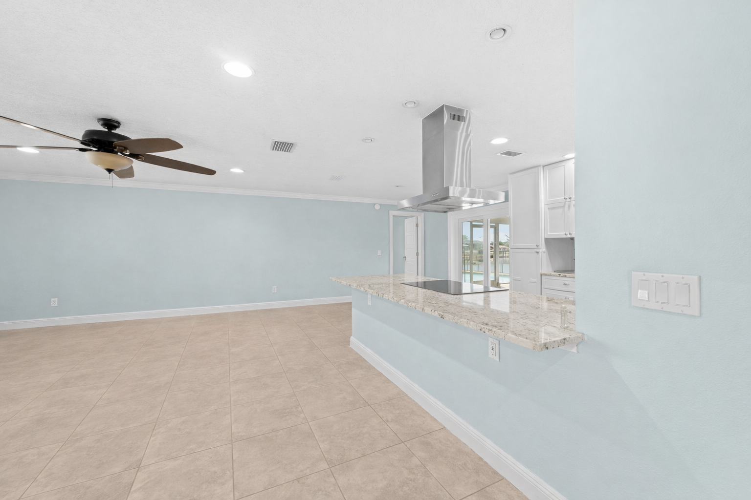 Granite kitchen counter with ceiling fan