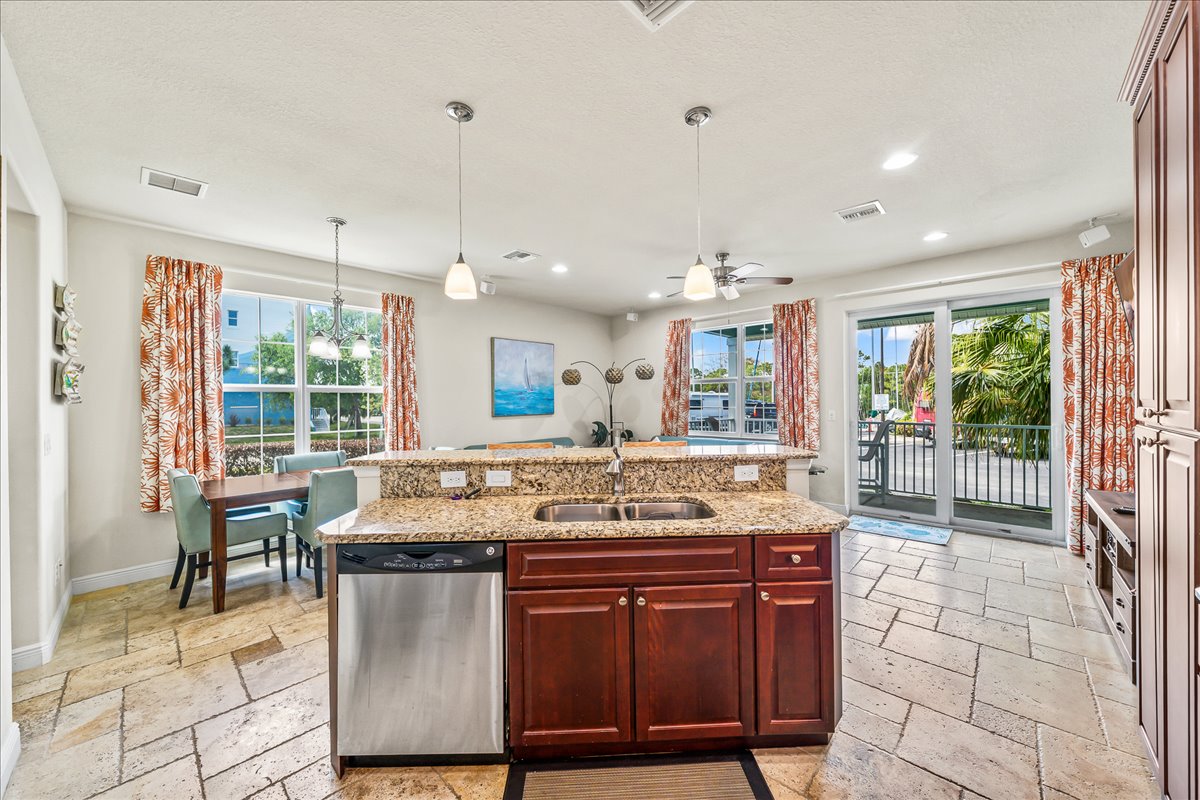 Granite kitchen island with open dining area