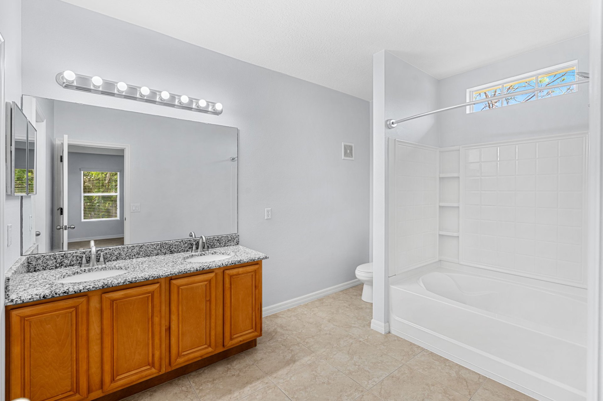Primary bath with double vanity and tub-shower combo