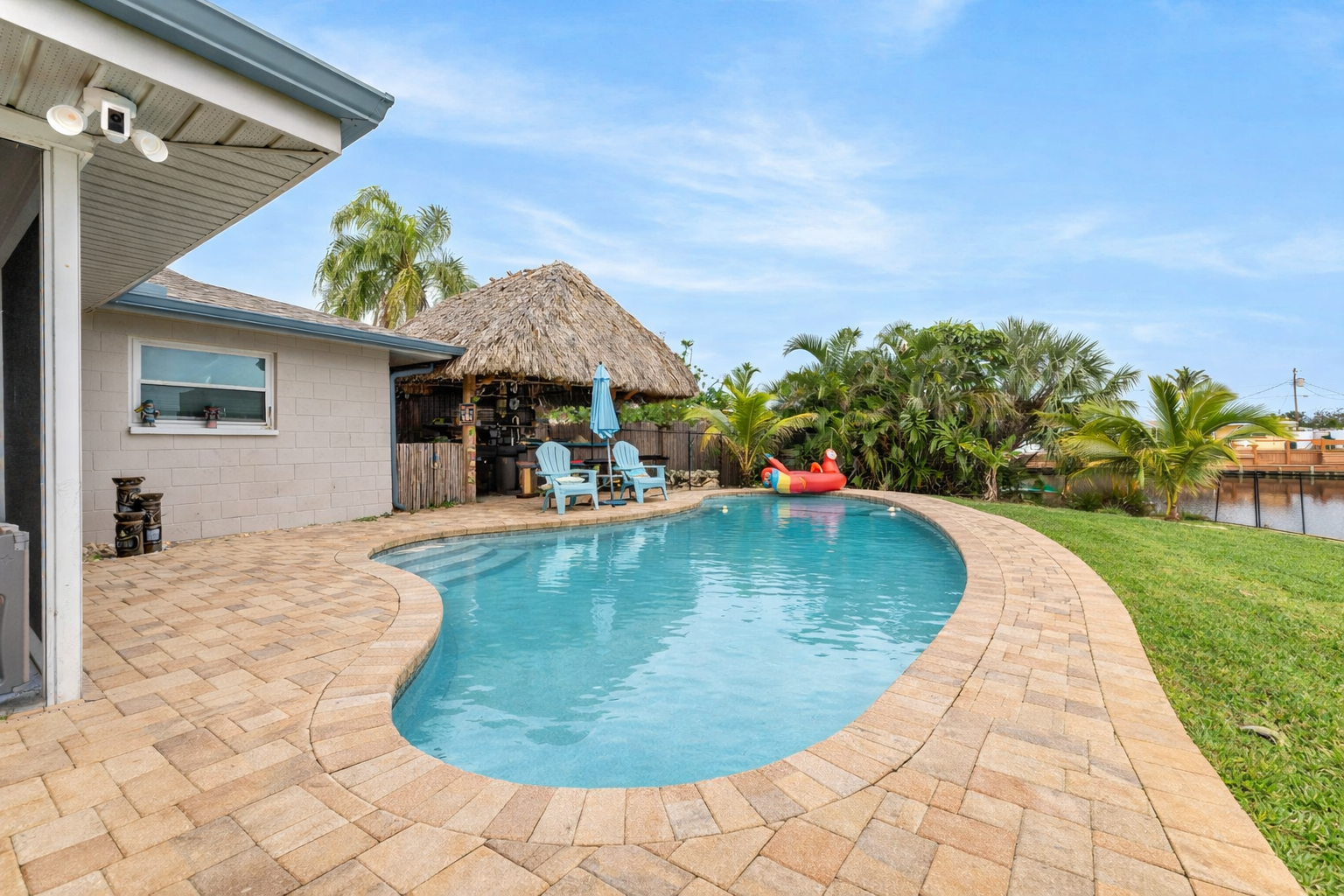 Saltwater pool beside the tiki bar and tropical landscaping