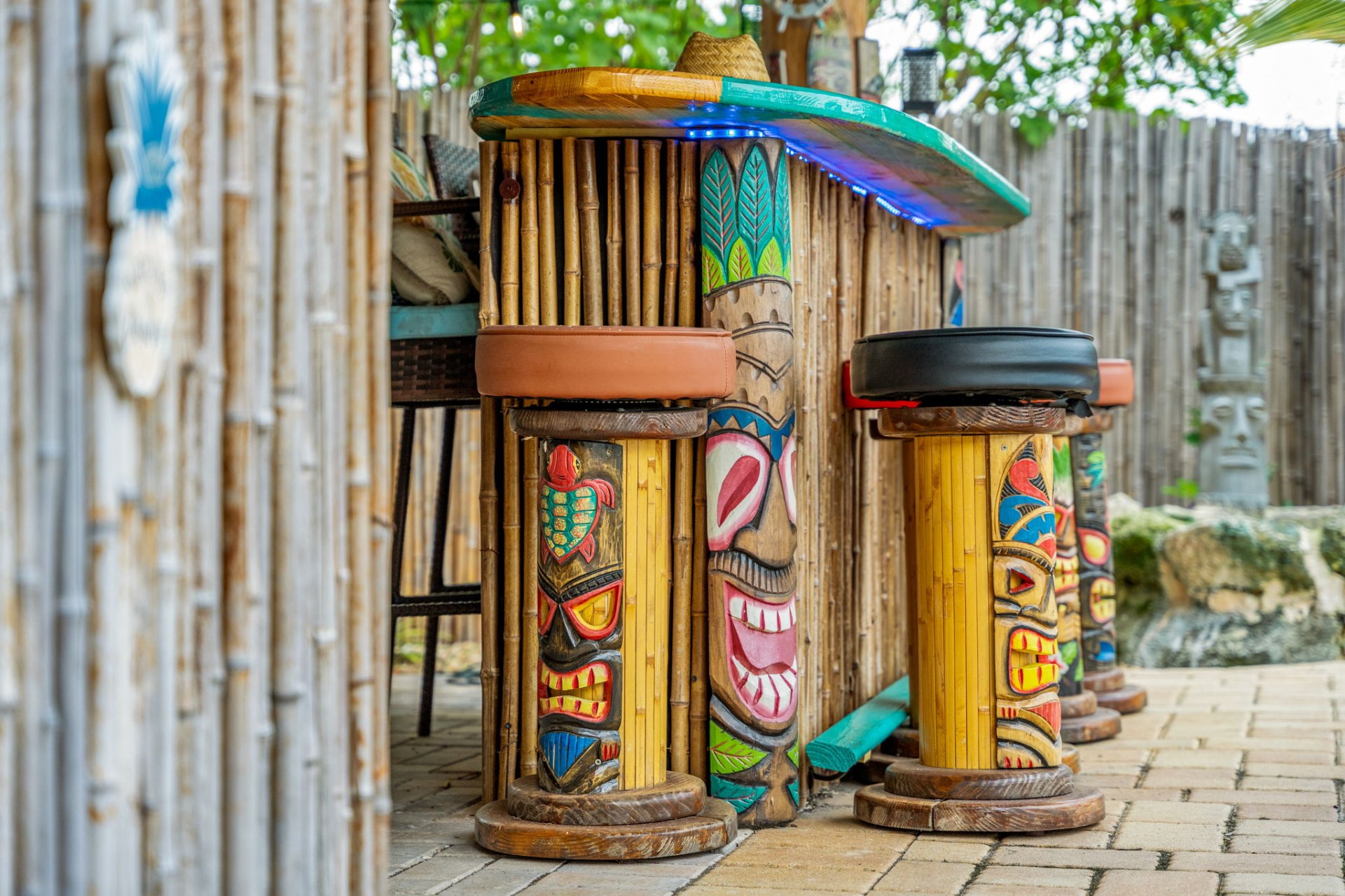 Close-up of hand-painted tiki bar stools